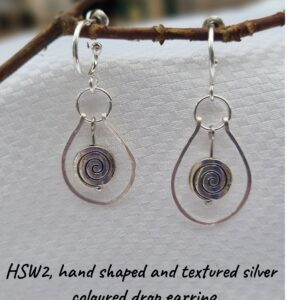 Earrings - Hand shaped and textured silver coloured drop