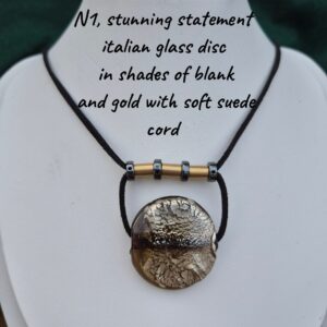Necklace - Italian glass disc in shades of black and gold with soft suede cord